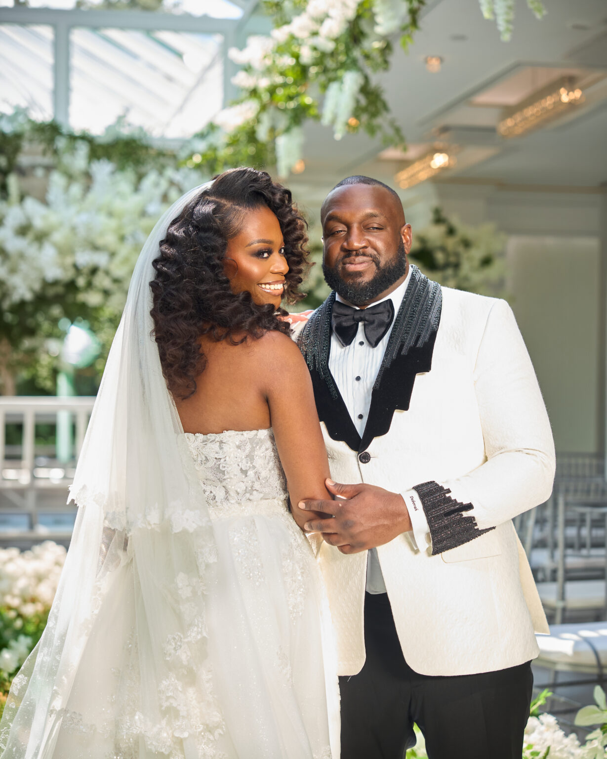 Bride and groom laughing together